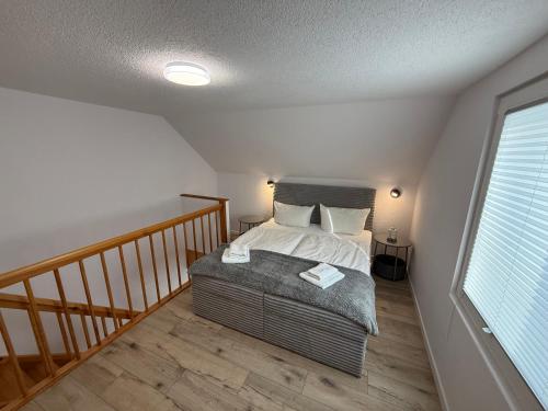 a bedroom with a bed in a room at Wittower Heide 40-2 in Glowe