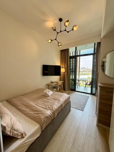 Chic Cozy Studio in Azizi Riviera Meydan - Msgetaways
