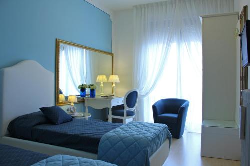 Una cama o camas en una habitación de Hotel Continentale