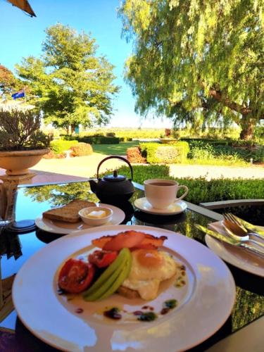 a plate of food on top of a table at Barossa House in Tanunda