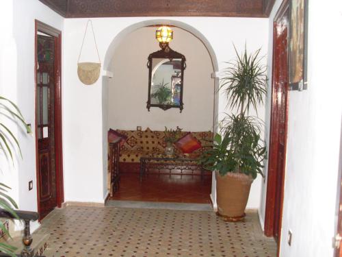 an entrance to a living room with a couch at The Medina Hostel in Tangier