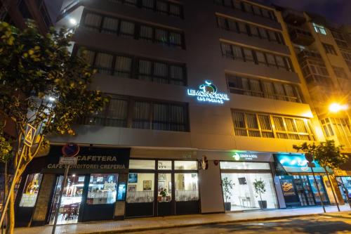 a building with a sign on the front of it at URBANSEA Atlanta in Las Palmas de Gran Canaria