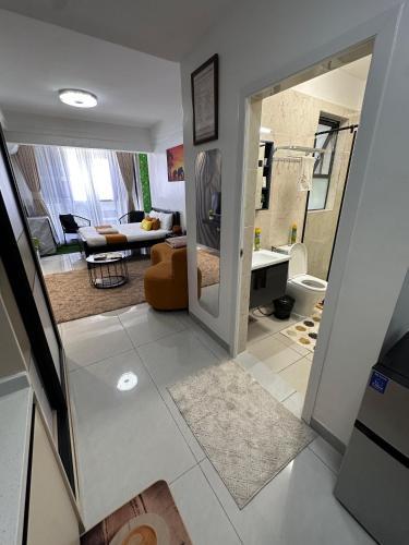 a living room with a view of a living room at Elite Homes furnished Studio near JKIA in Syokimau