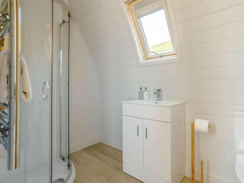 a bathroom with a shower and a sink at 1 Bed in Tain oc-81337 in Nigg