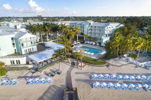 an aerial view of a resort with a swimming pool at The Reach Key West, Curio Collection by Hilton in Key West