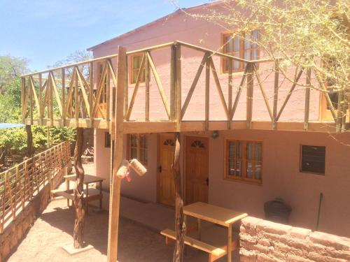 a house under construction with a roof at Refugio Don Natu in San Pedro de Atacama