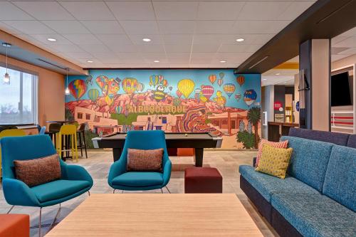 a lobby with a ping pong table and chairs at Tru By Hilton Albuquerque North I-25, Nm in Albuquerque