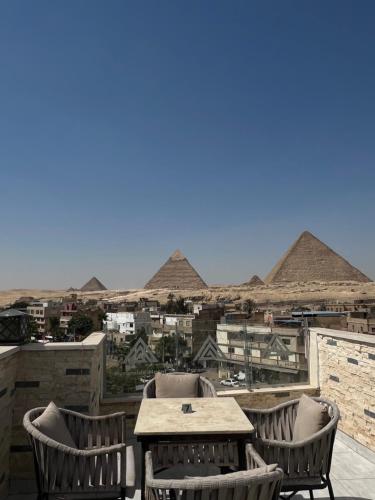 Youssef pyramids view