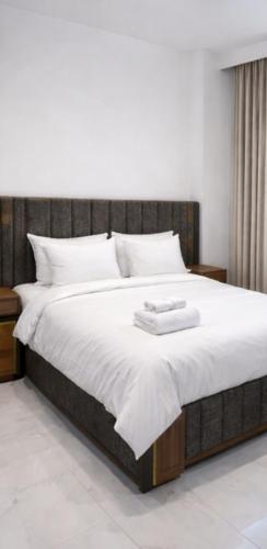 Llit o llits en una habitació de Nile Hotel