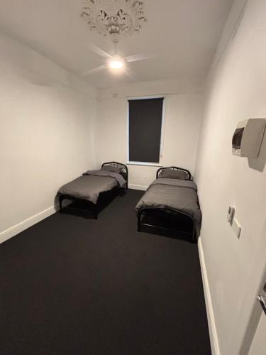 Llit o llits en una habitació de Nomad North Hostel