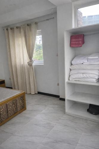 Llit o llits en una habitació de Nile Hotel