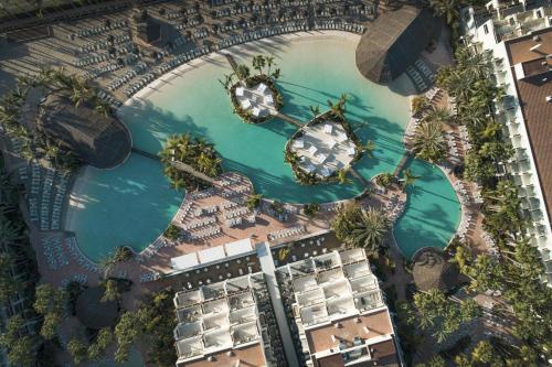 an overhead view of a river with two boats at Tabaiba Princess in Maspalomas