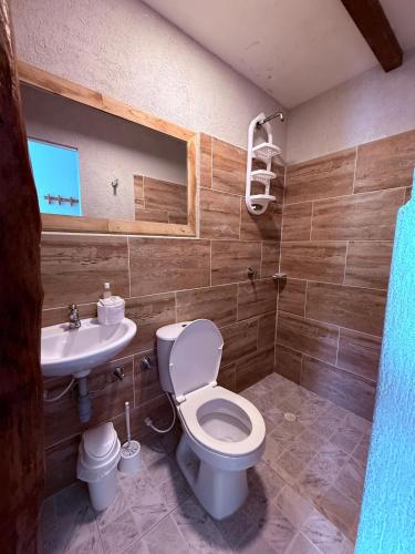 a bathroom with a toilet and a sink at Roma beach in Cartagena de Indias
