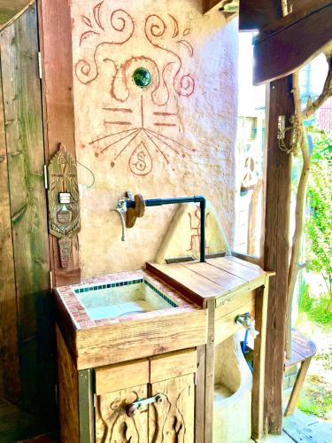 a bathroom with a wooden sink with aampunk at Tida House - Vacation STAY 07404v in Koshimizu-shigai