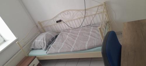 a bunk bed with two pillows on it in a room at Ela Gar 6 WG Zimmer in Garsten