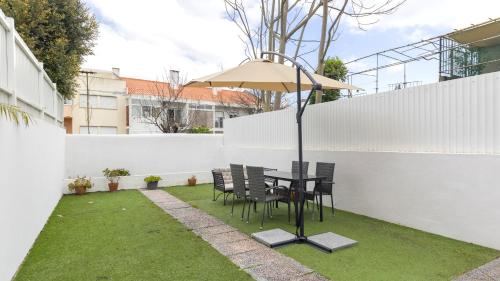 Lisbon City Apartment with Patio by LovelyStay