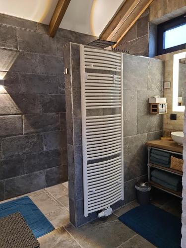 a bathroom with a toilet and a sink at Ferienhaus Sweet-Escape in Löningen