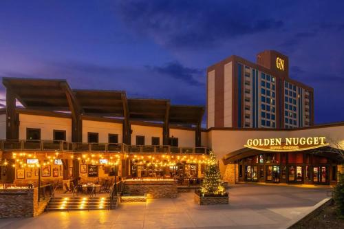 a hotel exterior with lights in front of a building at Golden Nugget Lake Tahoe in Stateline