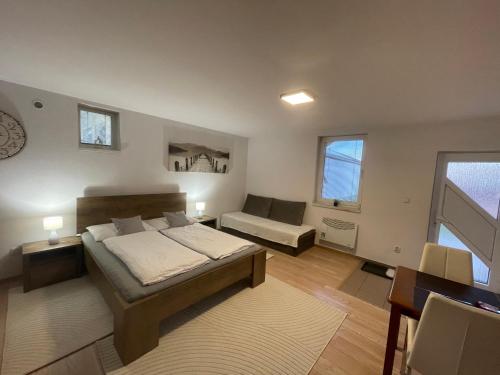 Llit o llits en una habitació de Apartmany Star