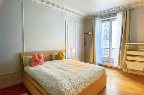 Un grand 3p haussmannien situé à côté des Galeries Lafayette