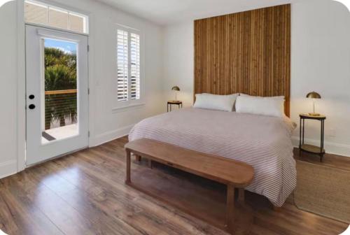 a bedroom with a large bed and a window at Simply Adventurous Too in Mexico Beach