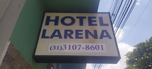 a sign for a hotel laengena on a building at Hotel econômico in Sete Lagoas