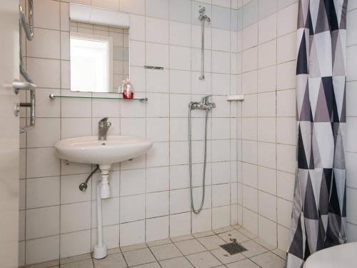 a bathroom with a sink and a shower at 6 person holiday home on a holiday park in Hejls in Hejls