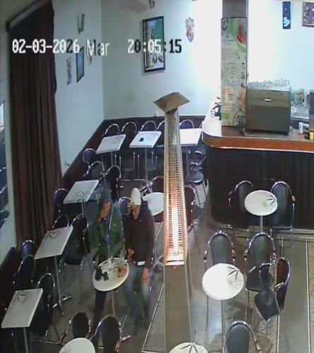 a group of people in a classroom with a guitar at Hôtel des cedresazrou in Azrou