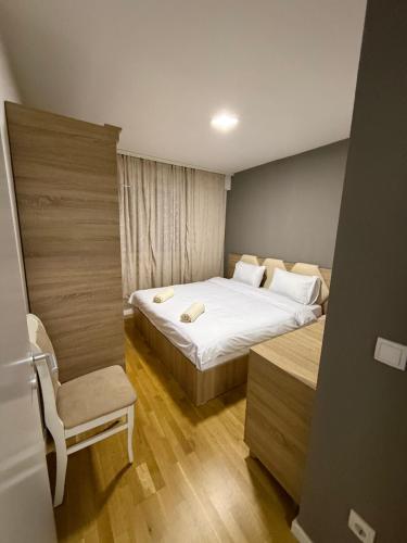 เตียงในห้องที่ Rooftop Apartment 2
