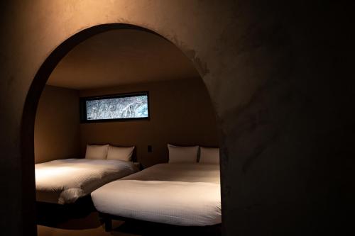 Llit o llits en una habitació de 然 zen
