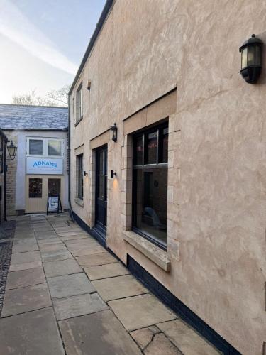 a building with windows on the side of it at Pettifer's Loft in Lincolnshire