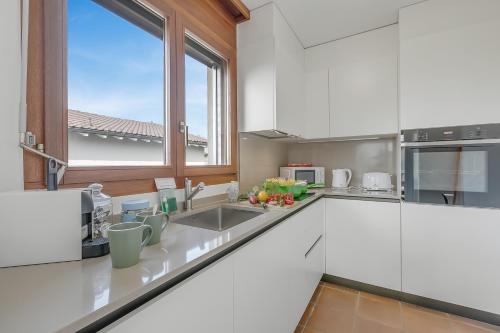 Casa Di Bea - Lugano 1BR with Terrace & Parking - Happy Rentals