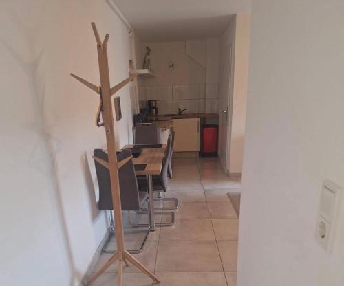 a room with a table with a cross on the wall at Deck 3 in Cuxhaven
