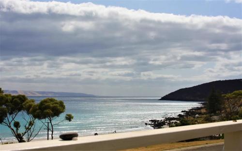 a view of the ocean from a balcony at Penneshaw Beach House in Penneshaw