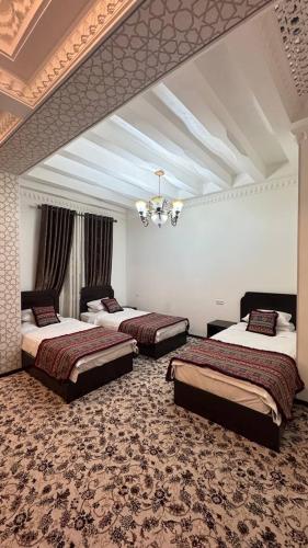 Postel nebo postele na pokoji v ubytování Demir Hotel