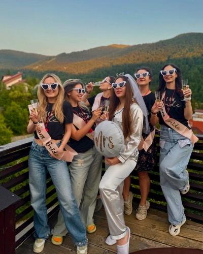 a group of women holding glasses of wine at 30 Forest, Azuga in Azuga