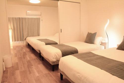 桃谷1丁目テラスハウスWalking distance to Osaka Korean Town Accommodates up to 10 guests