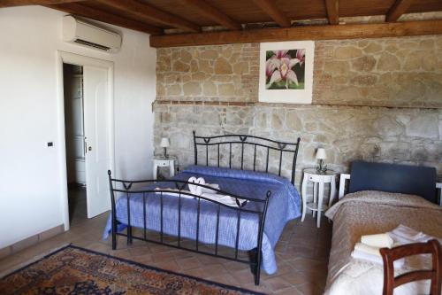 Postel nebo postele na pokoji v ubytování Il Borgo Ariccia Resort