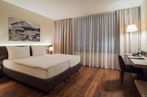 Postel nebo postele na pokoji v ubytování Hotel one66 (free parking garage)