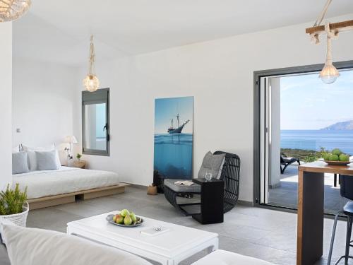 Postel nebo postele na pokoji v ubytování Arpathea Villas