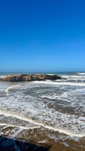 a view of the ocean from the beach at Riad d'exception vue mer au coeur de la médina Essaouira - Mandji Dream in Essaouira