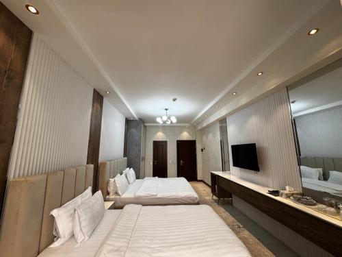 Katil atau katil-katil dalam bilik di Firdavsi Hotel