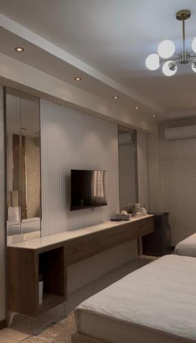 Katil atau katil-katil dalam bilik di Firdavsi Hotel