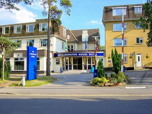 a building with a sign that reads the hammond house hotel at Carrington House Hotel in Bournemouth