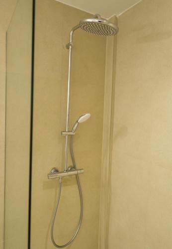 a shower with a shower head in a bathroom at Villa Selina 3 - Etheras Properties in Kythira