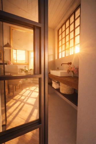 a bathroom with a sink and a mirror at Boutique Loft Studio in Kreuzlingen