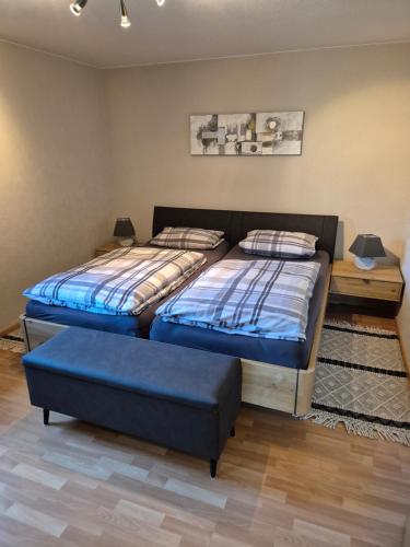 two twin beds in a room with at Ferienhof Michaelis in Bruchhausen-Vilsen