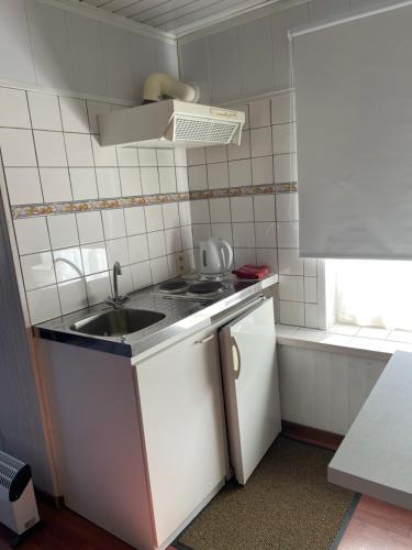 Kuhinja ili čajna kuhinja u objektu Beau-sejour