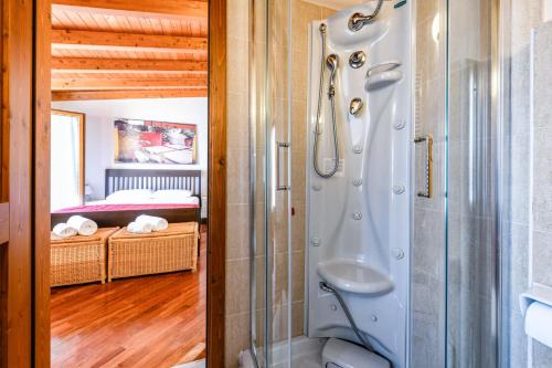 a bathroom with a shower and a sink at Luxury Castle View in Sirmione