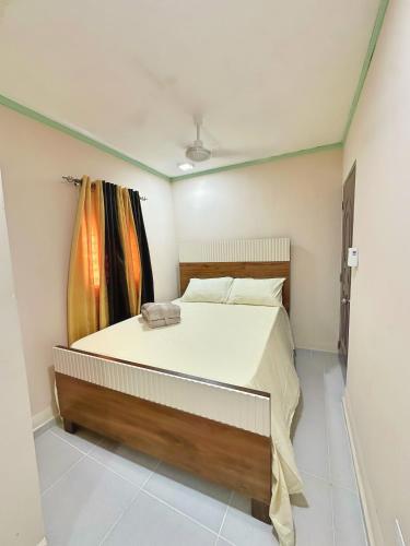 a bedroom with a large bed in a room at Casa Mar y Campo in San Felipe de Puerto Plata